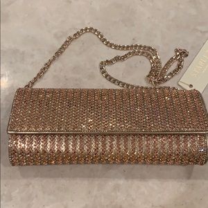 New rose gold sparkly clutch cross body purse.